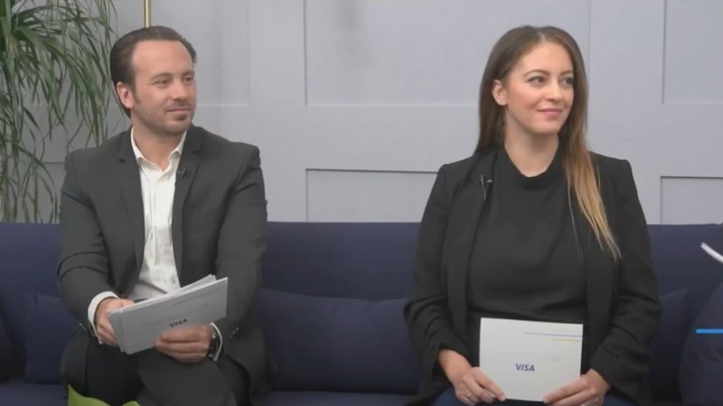 man and woman speaking at webinar